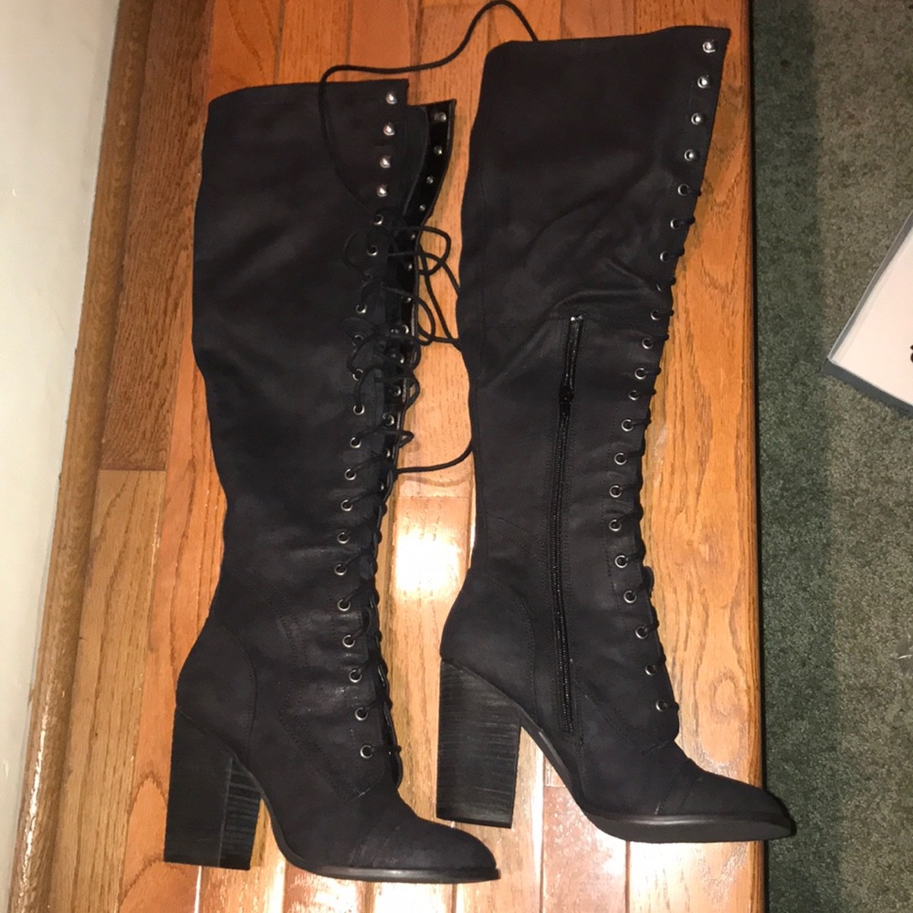 Over the knee heeled lace up boots